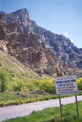 Warning sign in Rock Canyon, Squaw Peak above